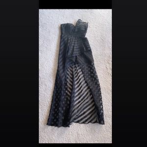 Black Bariano High-lo black dress with geometric pattern and slit.